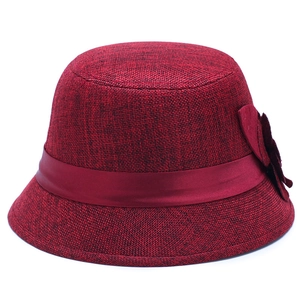 Elegant burgundy linen sun hat for women with floral ribbon decoration and wide brim