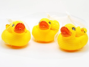 Yellow rubber duck bath toy set in white mesh bag featuring one large and small ducklings