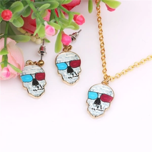 Detail of skull necklace and earrings set with 3D glasses pattern on gold frame