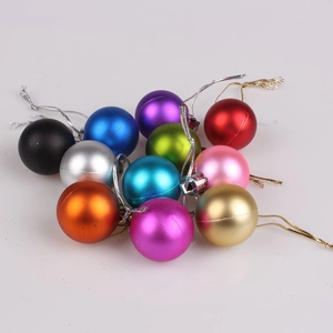 Macro shot of colorful 3cm Christmas ornaments with matte and glossy finishes for trees