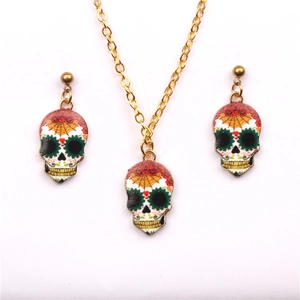 Punk style skull jewelry set including necklace and earrings with colorful skull patterns