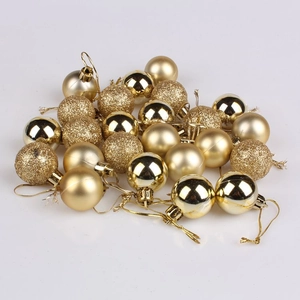 Detail of 3cm gold Christmas balls showing glossy, matte, and glitter textures in a set