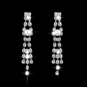 Elegant bridal jewelry set with pearl drop earrings and sparkling crystal tassels