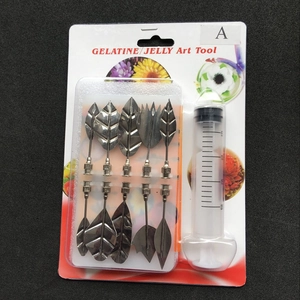 GELATINE Art Tool kit with 10 stainless steel tips and a plastic syringe on dark background