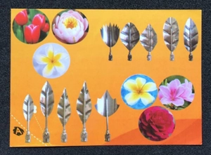 Macro detail of 10 piece stainless steel 3D jelly cake tools with diverse petal nozzle shapes