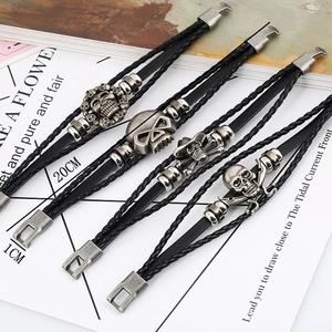 Men's woven black leather skull bracelets with silver gothic charms, size 20cm by 1cm