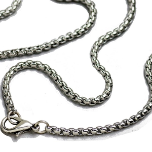 Detail of silver stainless steel box chain necklace with a secure lobster clasp