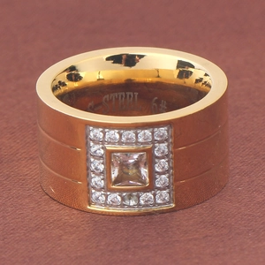 Macro shot of 12mm 18K gold plated stainless steel ring with square zirconia stones