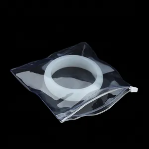 Thick PVC clear resealable zipper bag for jewelry with white translucent bracelet inside