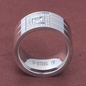 Silver stainless steel ring with square cubic zirconia stone in a professional close-up