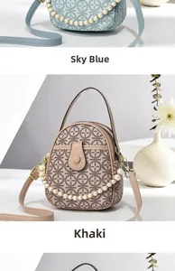 Detail view of mini crossbody bags in sky blue and khaki with pearl chain and logo pattern