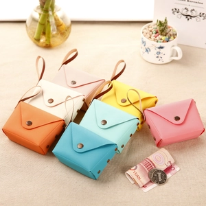 Mini macaron candy color coin purses in various shades with retro metal snaps and straps