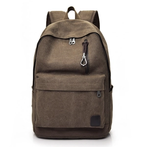 Classic dark coffee canvas backpack with front zipper pocket and retro student style
