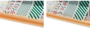 Close-up of serrated cutting edge on orange tape dispenser with washi tape rolls