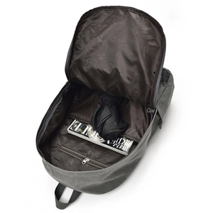 Deep grey canvas backpack with spacious main compartment and branded lining