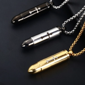 Cross engraved bullet urn necklaces for ashes in black, silver, and gold steel