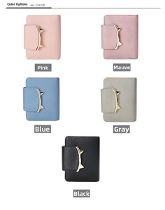 Flat lay of colorful women's tassel zip wallets in pink, red, blue, grey, and black