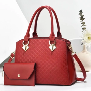 Red quilted leather tote bag and envelope pouch set with gold hardware and top handles