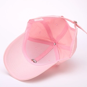 Pink cotton baseball cap with interior structure details and adjustable metal buckle strap