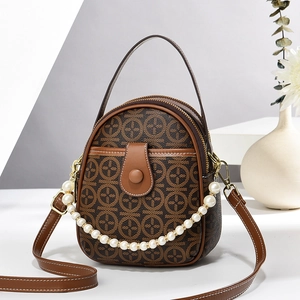 Vintage brown monogram mini crossbody bag with pearl chain and adjustable strap