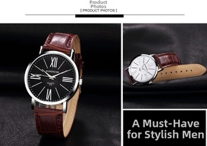 Detail of quartz watch with silver metal case, Roman numerals and brown leather strap