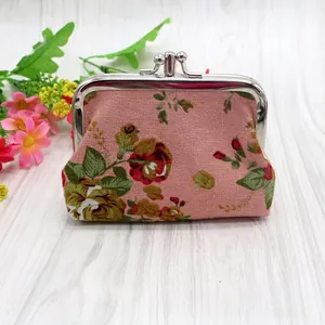 Pink floral canvas coin purse with vintage rose patterns and silver metal clasp closure