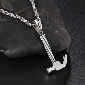 Titanium steel hammer pendant necklace with twisted rope chain on dark stone surface