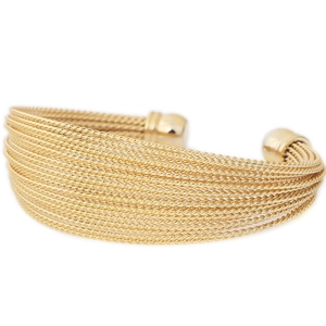 Macro shot of 20mm gold stainless steel twisted cable cuff bracelet with ball ends