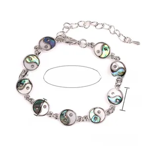 Detailed view of Yin Yang Tai Chi link bracelet with adjustable lobster clasp and extension