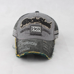 Detailed close-up of distressed vintage 1969 baseball cap with 3D rock shank embroidery
