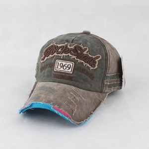 Detail of vintage washed baseball cap featuring 3D Rock Shark embroidery and 1969 logo