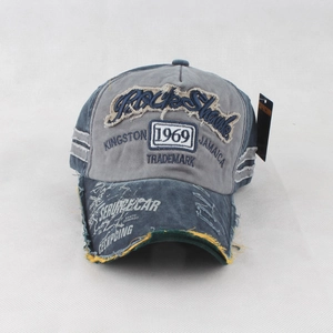 Close-up of distressed brim details on 1969 vintage baseball cap with yellow lining