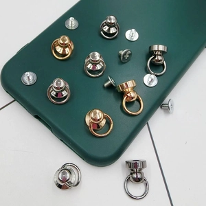 DIY phone case hardware set with metal D-rings and screws in gold, silver, and black finishes