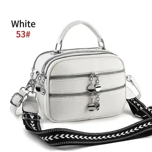 White multi-layer crossbody bag with wide woven strap and lychee texture finish