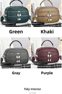 Detail of four colorful crossbody bags with multiple zippers and patterned straps