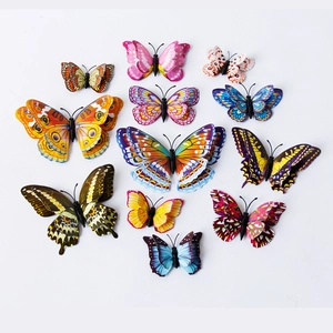 Set of 12 luminous 3D double-layer butterfly wall stickers in various colors on white background
