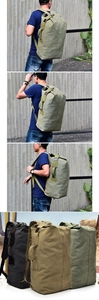 Three colors of canvas travel backpacks in army green, khaki and dark grey with straps