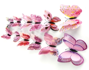 Macro view of 3D double-layer butterfly wall stickers in pink and purple colors