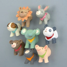 Group of resin animal fridge magnets featuring lion rabbit panda and elephant shapes