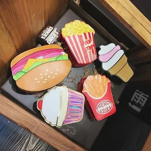 Detail showing fun burger, popcorn, and french fries shaped mini crossbody chain bags