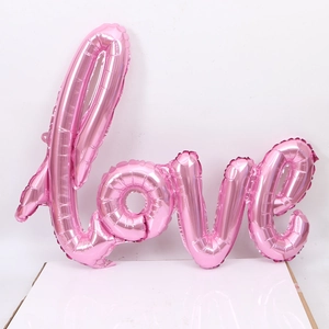 Pink cursive LOVE script aluminum foil balloon for wedding and Valentine decor