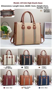 Detailed view of large tote bag dimensions 32x12x25cm with textured synthetic leather