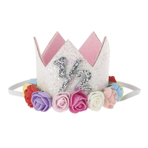 Detailed view of baby half birthday crown with 1/2 silver glitter and colorful roses