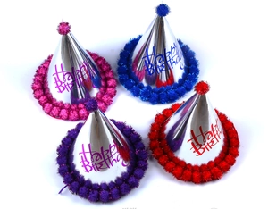 Set of four shiny metallic party hats with pompoms and Happy Birthday text on white background