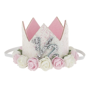 Detail of half birthday crown with pink faux roses and silver glitter 1/2 number