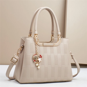 Elegant beige checkered crossbody bag with chic pearl charms and detachable strap