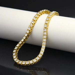 Detail showing high-quality gold plating and sparkling clear rhinestones on the tennis bracelet