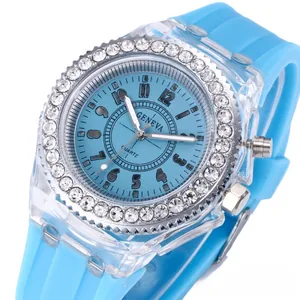Macro shot of light blue silicone strap watch with rhinestone bezel and transparent case