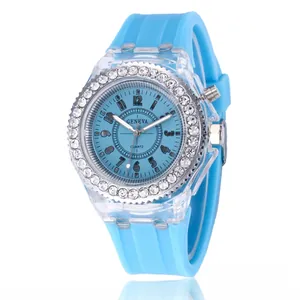 Close-up of light blue LED silicone watch with rhinestone bezel and transparent case