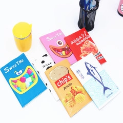 Cuadernos creativos con diseño de snacks, papas fritas y cartones de leche para regalos.